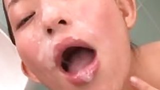Cute Japanese girs face covered in cum after bukkake