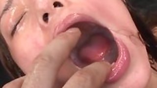 Cute Japanese girl takes facial after blowjob