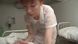Horny patient finger fucks her hot Asian nurse while on duty
