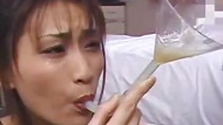 ASIAN GIRL SWALLOW FROM FUNNEL