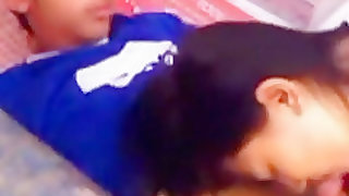 Cute asian girl makes-out with her bf and gives him a blowjob