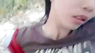 Asian girl gets fucked on her bf's motorbike in nature