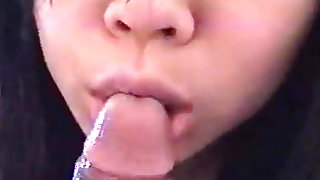sexy brunette from Japan is sucking that long dick