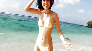 She takes hot beach photos