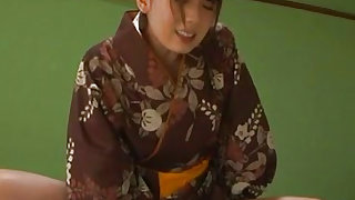 Elegant asian  in kimono is swallowing big erection