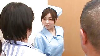 Horny nurse looks eager to deal all these dicks between her lips