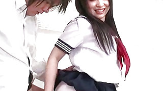Handsome schoolgirl in panties is doing handjob to her teacher